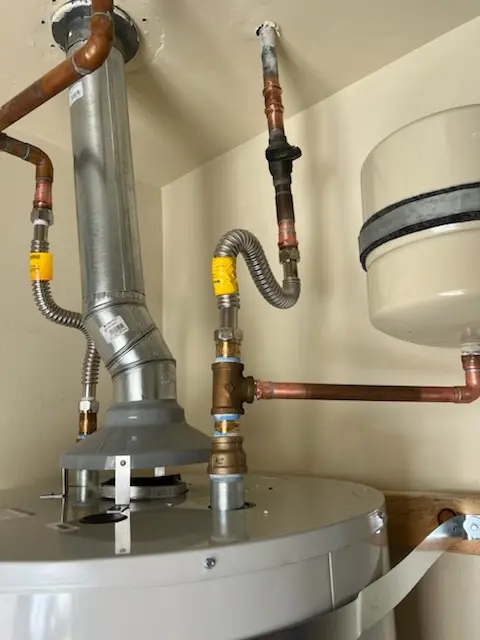 Water heater installation and plumbing repair in Central